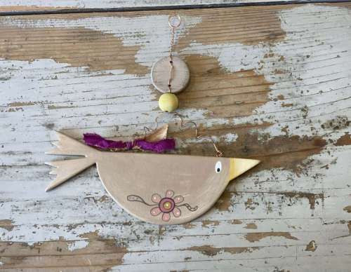 κοτσύφι μπέζ με λουλούδι