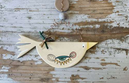 κοτσύφι μπέζ με μάτι